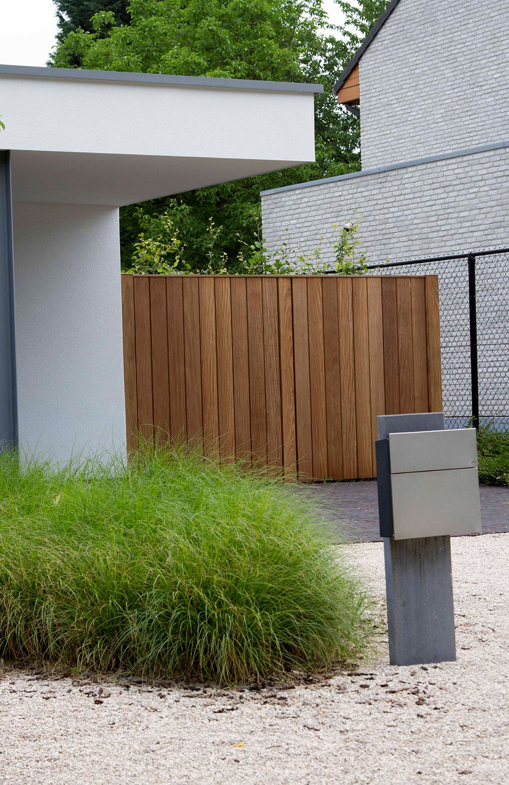 Houten tuindeur met panelen – realisatie Diba Outdoor